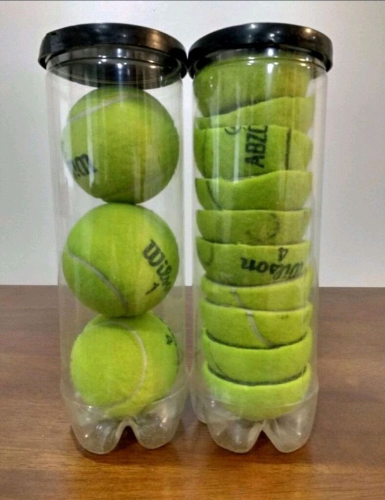 tennis balls squeezed into can