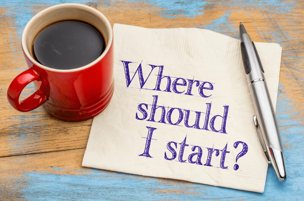 Coffee mug with note asking where should I start