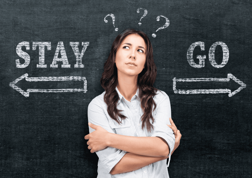 Women in front of chalkboard with arrow pointing left saying stay and arrow pointing right saying go