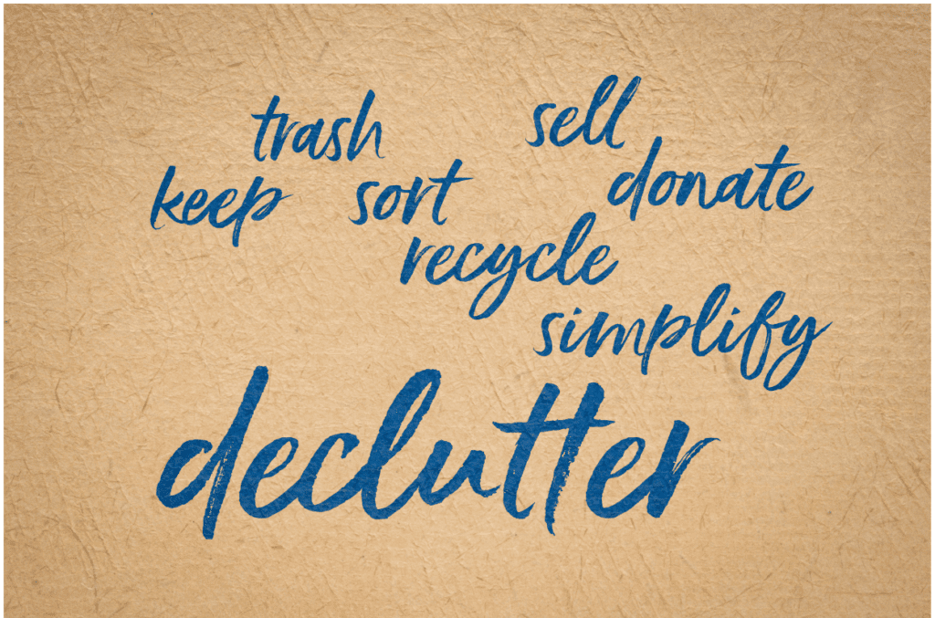 Sign that says declutter, sell, donate, keep, sort, recycle, trash, and simplify