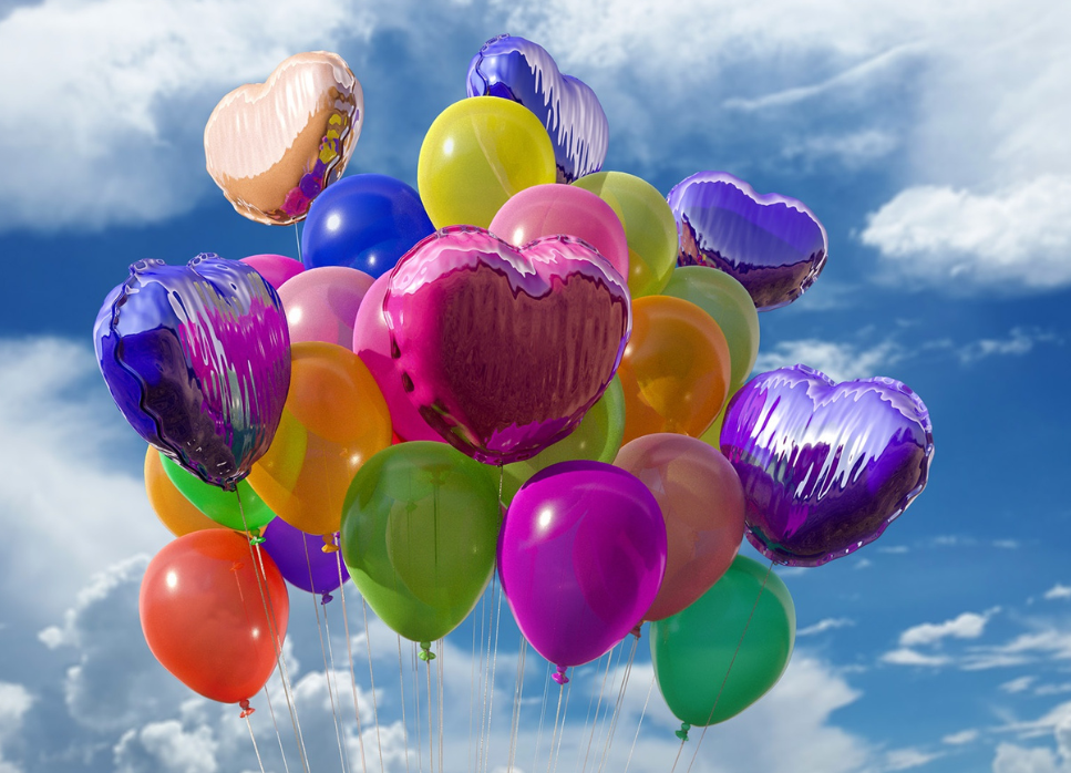 Balloon bouquet including some heart-shaped balloons