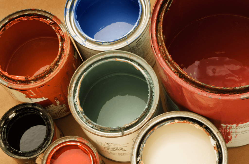 A group of open paint cans