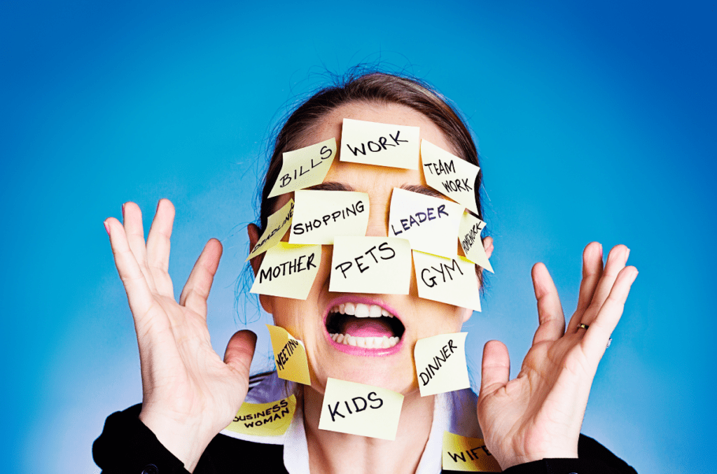 Woman with post-it notes all over her face. Each post-it note has a task that needs to be done at home