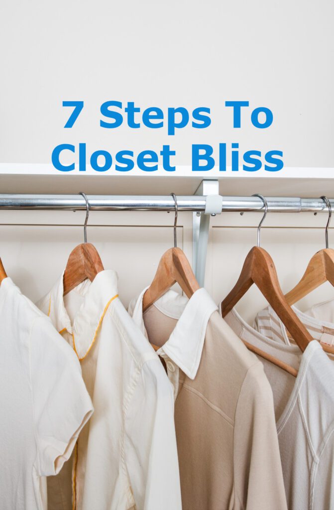 A few light-colored shirts hanging on a closet rod and looking very peaceful