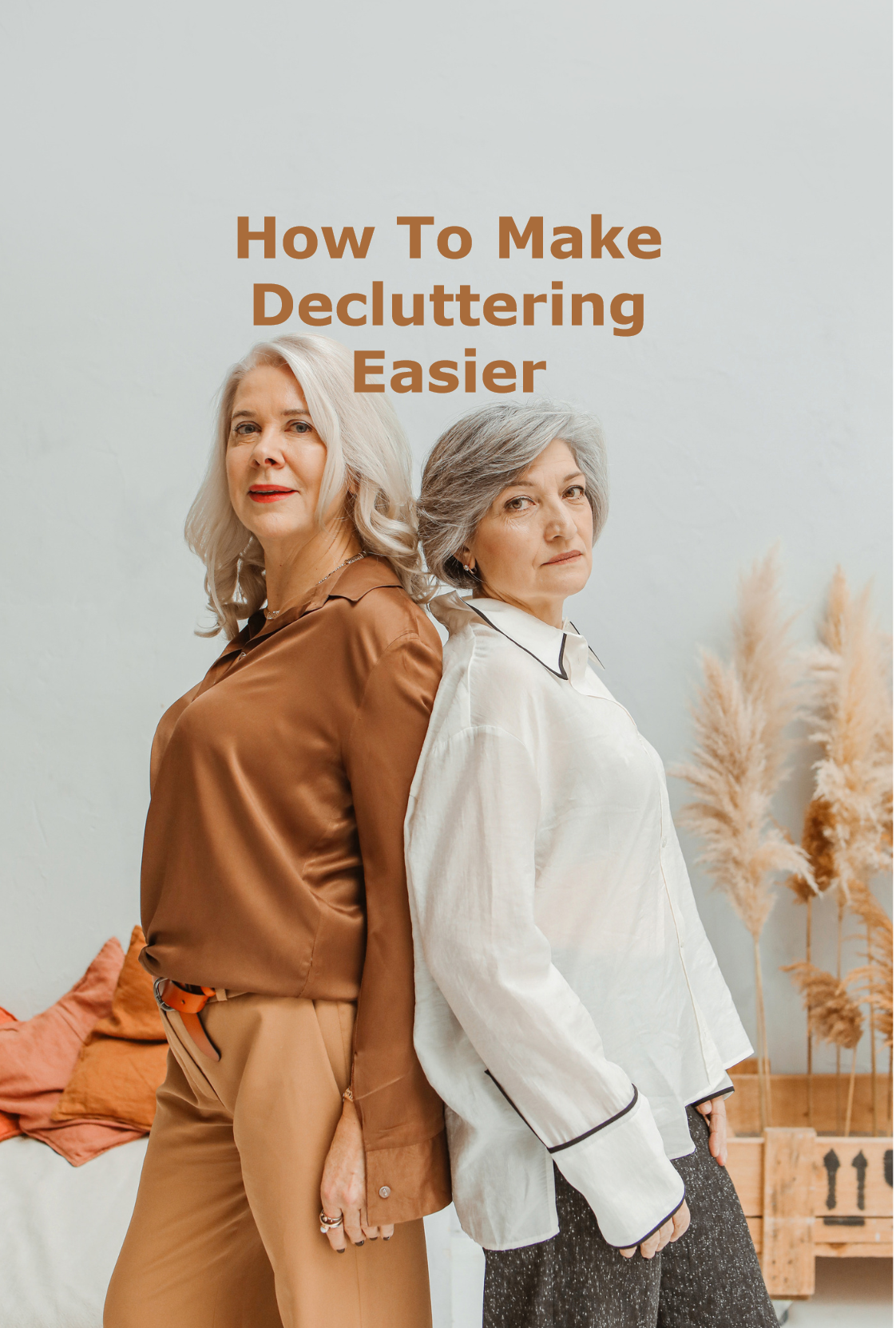 Two women standing back to back against a neutral background. They look determined. The caption reads, "How to make decluttering easier"